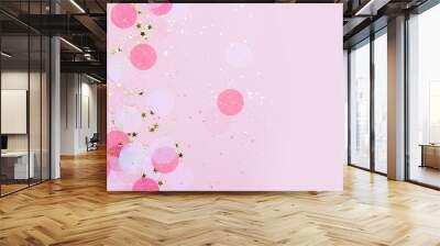 Pink confetti and stars and sparkles on pink background. Top view, flat lay. Copyspace for text. Bright and festive holiday background. For Christmas, New year, Mother's day. Wall mural