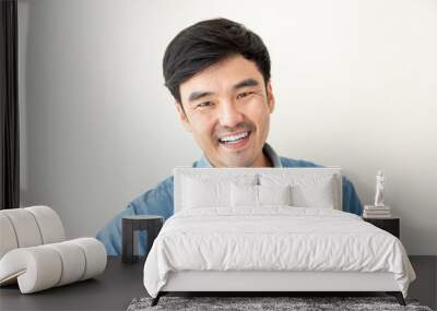 adult asian man.young male person.posing smiling laughing look excited surprised thinking positive happy.empty,copy space for text advertising.white background.attractive fashion Wall mural