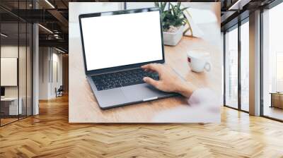 computer mockup blank screen.hand woman work using laptop with white background for advertising,contact business search information on desk at coffee shop.marketing and creative design Wall mural