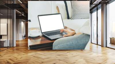 computer mockup blank screen.hand woman work using laptop with white background for advertising,contact business search information on desk at coffee shop.marketing and creative design Wall mural