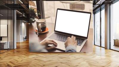 computer mockup image blank screen with white background for advertising text,hand woman using laptop contact business search information on desk at coffee shop.marketing and creative design Wall mural