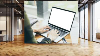 computer mockup image blank screen.hand woman work using laptop with white background for advertising,contact business search information on desk at coffee shop.marketing and creative design Wall mural