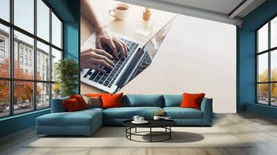 using computer.hand typing keyboard laptop online chatting search form internet while working sitting at coffee shop.concept for.technology device contact communication business people Wall mural