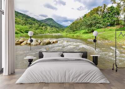 Lush Green Mountains and River at Kiriwong Village in Nakhon Si Thammarat Province Wall mural