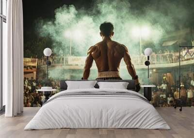 A fighter performing the traditional Wai Khru before a match, surrounded by an audience in a local stadium, showcasing the cultural roots and rituals of Muay Thai. Wall mural