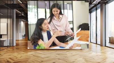 Asian woman succeeds at office Wall mural