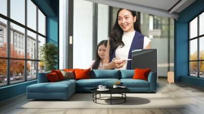 Asian woman succeeds at office Wall mural