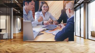 Businessman using hand gesture while explain business plan and discussion in the meeting. Selected focus Wall mural