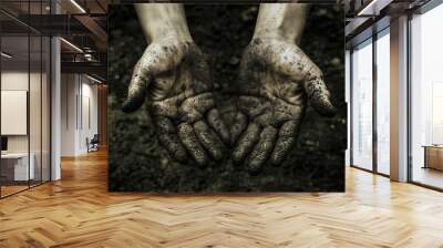 The hands are dirty and muddy, and they are open to show the dirt. The image has a mood of dirtiness and grime Wall mural