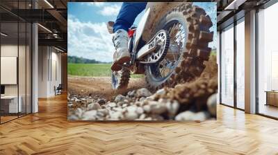 Person riding dirt bike track rider is wearing Low-angle shot Wall mural