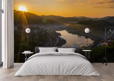 Aerial landscape of Ban Rak Thai with sunrise in the morning located in Maehongsan province, Thailand. Wall mural