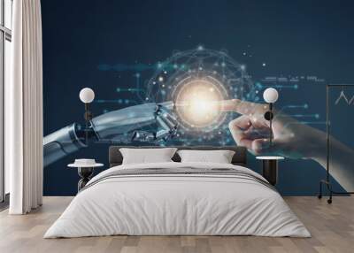 AI technology concept, Machine Learning, Robot hand touching human hand. to connect with global data refers to how humans can create and control artificial intelligence, AI innovation and technology. Wall mural