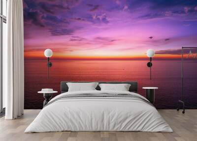 Aerial view sunset sky, Nature beautiful Light Sunset or sunrise over sea, Colorful dramatic majestic scenery Sky with Amazing clouds and waves in sunset sky purple light cloud background Wall mural