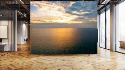 Aerial view sunset sky over sea,Nature Light Sunset or sunrise over ocean,Colorful dramatic scenery sky, Amazing clouds and waves in sunset sky beautiful light nature background Wall mural