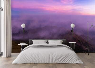 Beautiful landscape view Mountains with fog in sunrise sky at Indonesia Wall mural