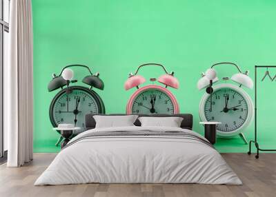 Beautiful three Alarm Clock on green screen Background Alarm Clock Face in daytime Minimal alarm clock Concept Time Zone Wall mural