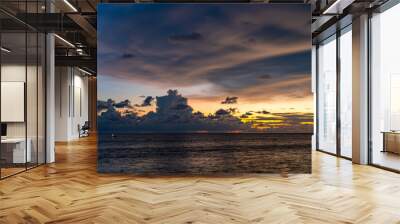 Colorful sky clouds over sea landscape background Wall mural