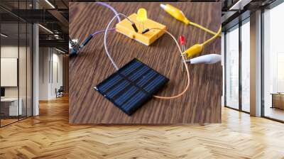 Solar panel, led, breadboard, switch, alligator clip wire together for educational prototype. Electronic lesson at school Wall mural