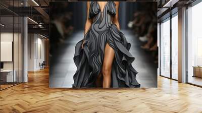 A runway filled with model showcasing the latest trends in haute couture at a glamorous Fashion Week event Wall mural