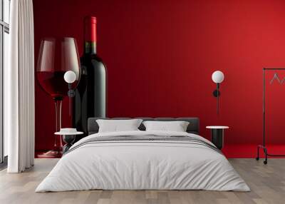 A bottle and glass of red wine on a vibrant red background  elegant composition Wall mural