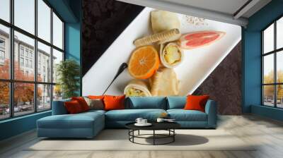 Pancakes with fruit and sauce Wall mural