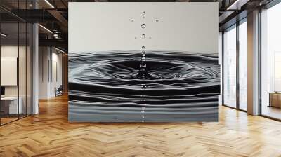 The simple elegance of a water droplet against a calm, motionless canvas Wall mural