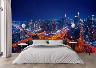 aerial top view night cityscape of dubai downtown skyscrapers with illuminated and highway. business Wall mural