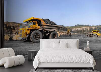 Big yellow mining truck for coal move. Open pit mine industry Wall mural