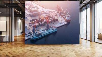 Container cargo ship loading North Arctic port. Concept freight transportation import export and business logistic, aerial view winter Wall mural