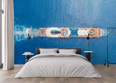 Cruise liner ship in ocean with blue water. Aerial top view Wall mural