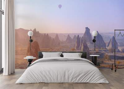 Landscape sunrise in Cappadocia with set colorful hot air balloon fly in sky with sun light. Concept tourist travel Goreme Turkey Wall mural