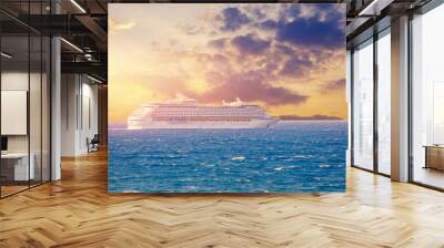 Luxury cruise ship sunset in blue sea with clouds Wall mural