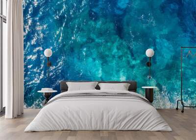 Raging blue water of open Mediterranean Sea with turquoise bottom. top view Wall mural