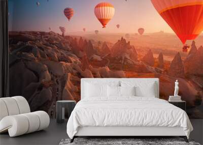 Tour excursion on horse autumn landscape with hot air balloons in Cappadocia Turkey top aerial view Wall mural