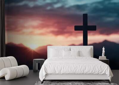 A serene landscape showcasing a cross silhouetted against a vibrant sunset, symbolizing faith and hope. Wall mural