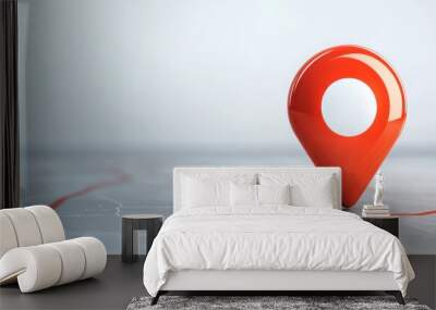 A vibrant red location pin on a smooth surface, symbolizing navigation and geographical positioning. Wall mural