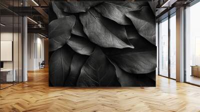 Abstract black leaves forming a textured pattern. Wall mural