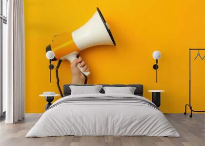 hand holding megaphone, marketing and sales background hand megaphone marketing sale concept orange background communication advertising promotion announcement loudspeaker Wall mural