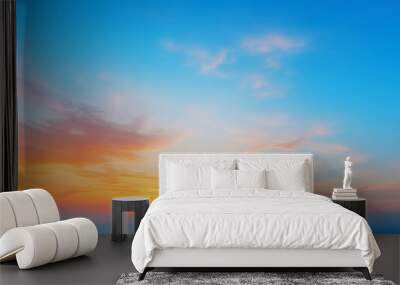 Abstract gradient sunrise in the sky with cloud and blue mix orange natural background. Wall mural