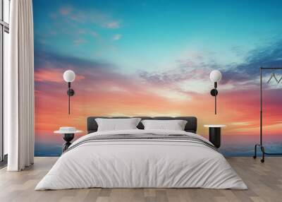 Abstract gradient sunrise in the sky with cloud and blue mix orange natural background. Wall mural