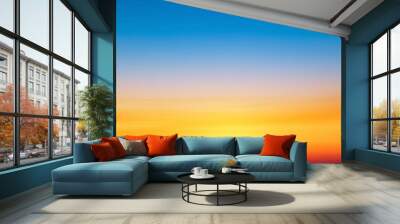 Abstract gradient sunrise in the sky with cloud and blue mix orange natural background. Wall mural