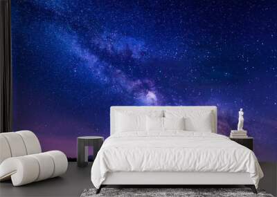 night starry sky and bright purple blue galaxy horizontal background Wall mural