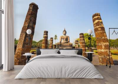 Ancient Buddha Statue at Sukhothai historical park, wat Mahathat Temple, Sukhothai Historical Park, Unesco Wall mural