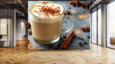 delicious cappuccino with cinnamon in a transparent glass mug on a gray background Wall mural