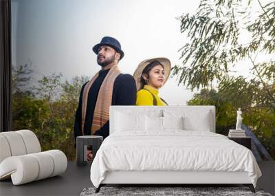 A young Indian couple shooting their pre wedding at a famous studio in Delhi India. Romantic couple having shoot Delhi. Best young couple India. Pre wedding Indian couple. Wall mural