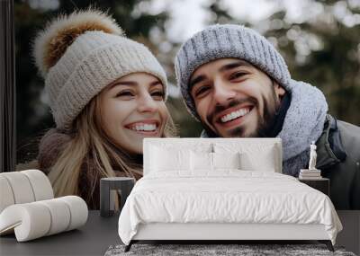 Young smiling couple in winter clothes, love and relationship concept Wall mural