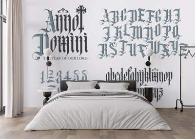 Latin phrase From the Nativity of Christ. Gothic font. Full set of capital, small letters and numbers of the English alphabet in vintage style. Medieval Latin letters. Vector calligraphy and lettering Wall mural