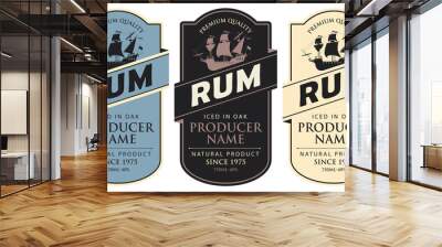 Set of three vector labels for rum in a figured frames with sailing ships and inscriptions in retro style. Premium quality, iced in oak, collection of strong alcoholic beverages Wall mural