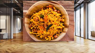 Srilankan style spicy snack mixture in a wooden bowl. Wall mural