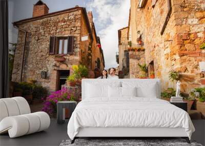 Beautiful Tourist Couple In Love Enjoying Rest In The Old City At Sunset Wall mural